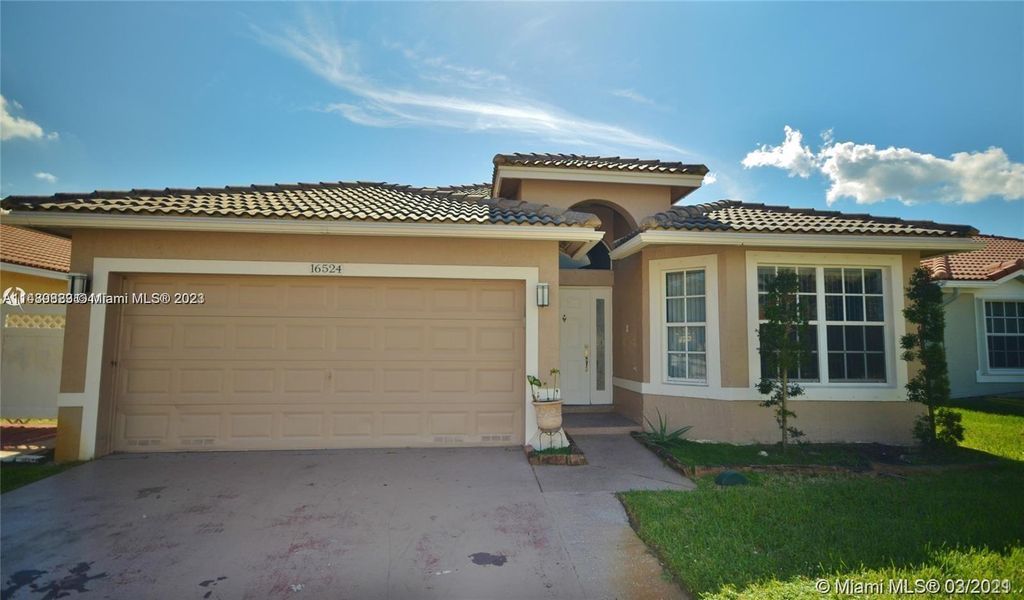 Photo of 16524 NW 24th St, Pembroke Pines, FL 33028 (MLS # A11489823)