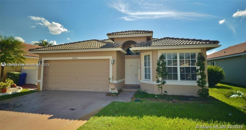 Photo of 16524 NW 24th St, Pembroke Pines, FL 33028 (MLS # A11489823)