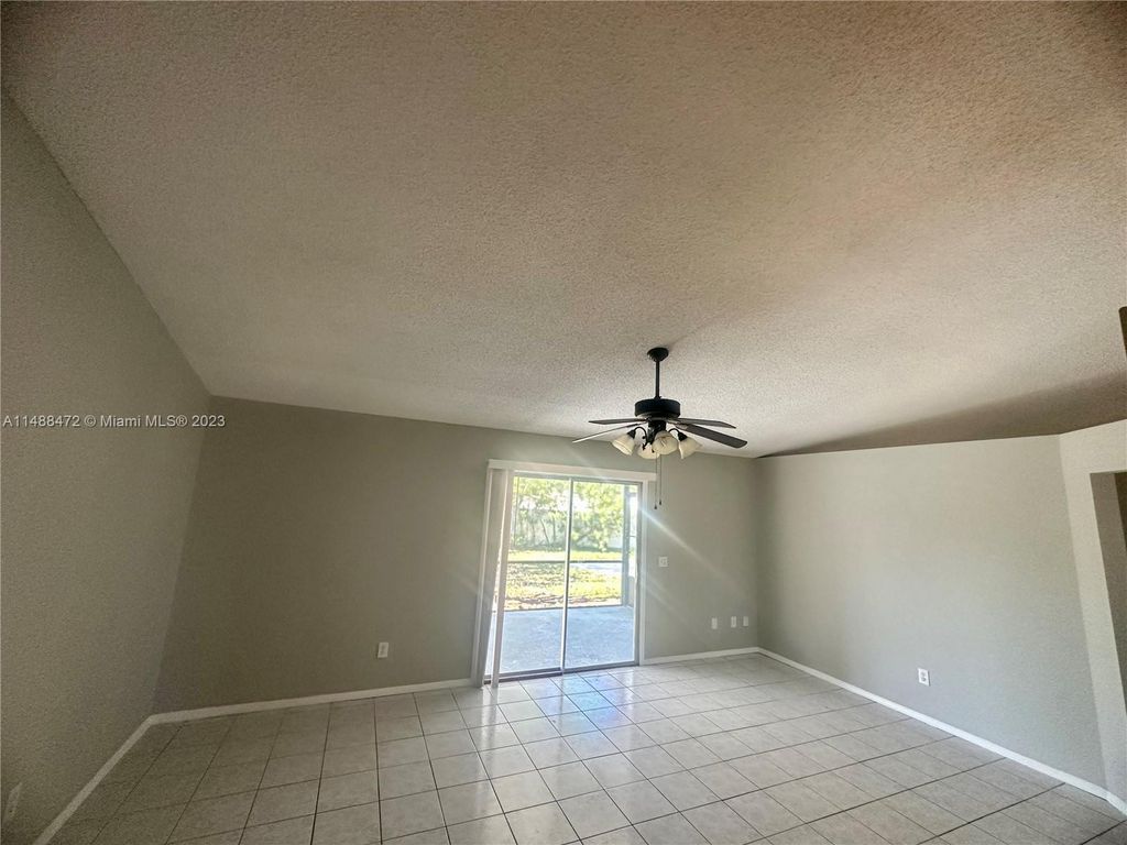 Photo of 1258 SW Cynthia St, Port Saint Lucie, FL 34983 (MLS # A11488472)