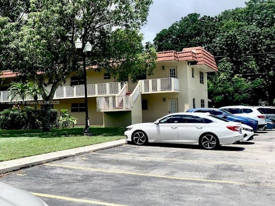 Spacious 2BR/2BA in the Heart of Pembroke Pines! Well-maintained unit featuring high volume ceilings and a split-bedroom floor plan. Main bedroom has generous walk-in closet. This unit has a split-bedroom layout. Separate living and dining areas offer flexible use of space. Full-size washer and dryer located in a dedicated laundry room. Extra storage within building laundry room. Conveniently located near shopping, dining such as Pembroke Lakes Mall. schools, and major highways.