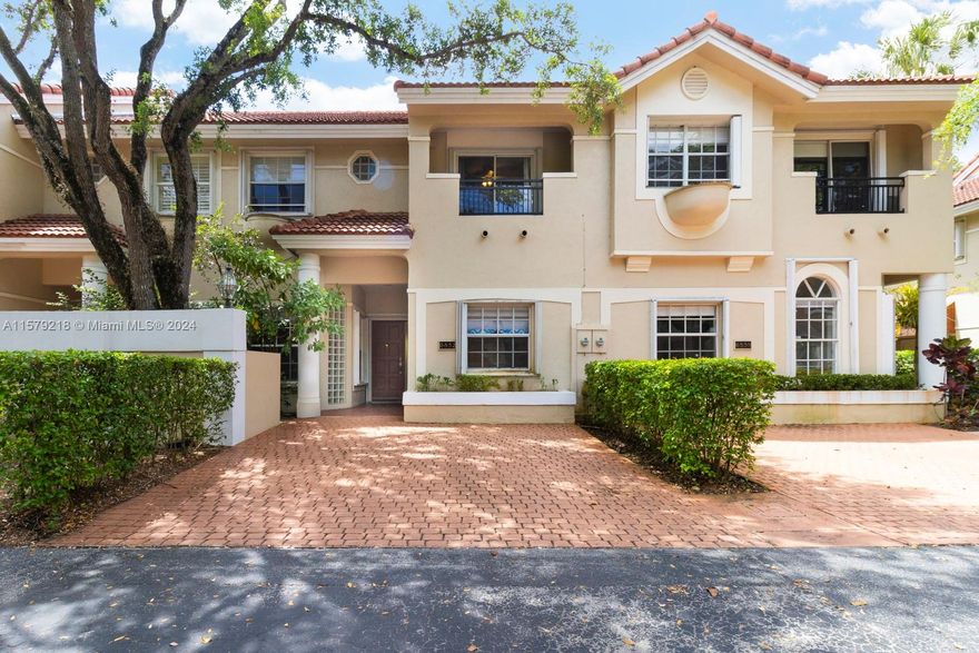 Rarely available unit with the desirable south facing patio/quiet side in Pinecrest's "Sutton Place," a community of only 28 town homes in Pinecrest school district and an easy walk to the Metrorail.  3 upstairs bedrooms, high ceilings, skylight, large updated eat-in kitchen, open living space, porcelain and carpet floors, lovely open and large private patio.  Fully gated and secure community with a pool, tennis court, and guest parking.