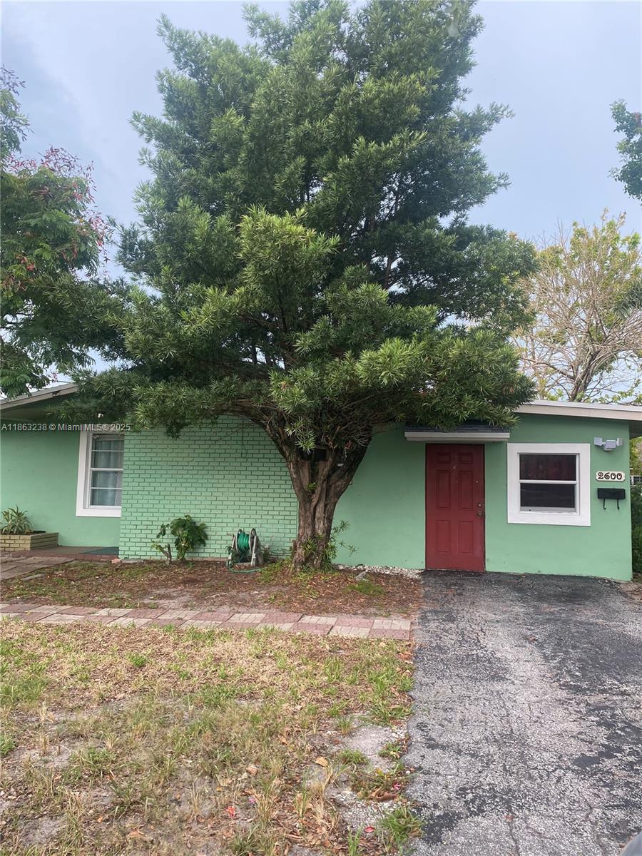 Spacious 2/2 Corner Lot with extra rooms that can be used as needed. Lots of Yard space..Changing Neighborhood on the up and up..