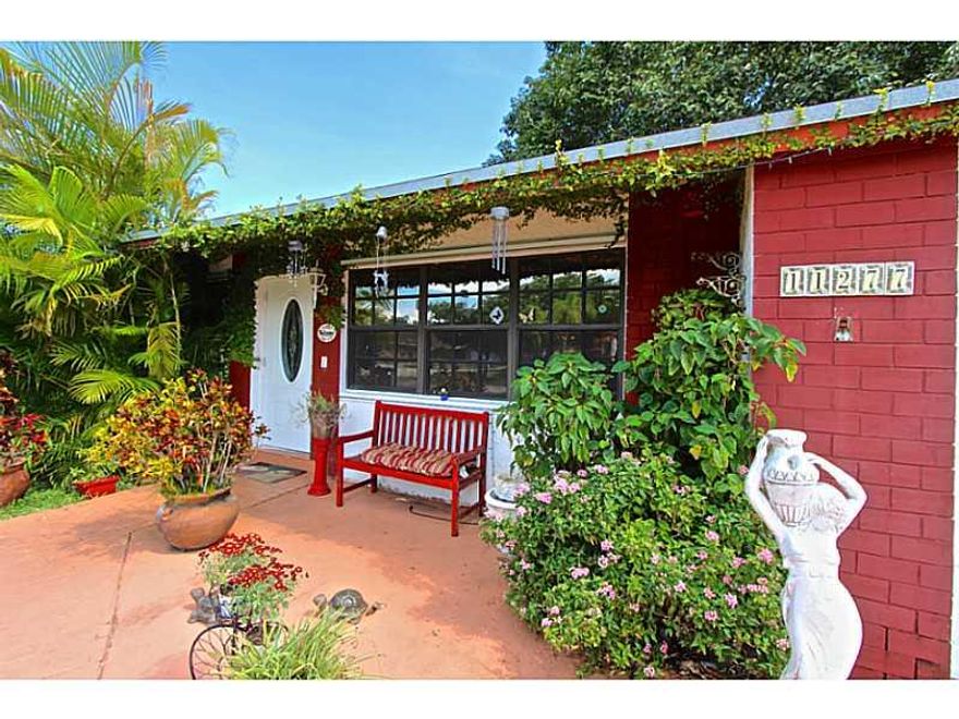 Completely Updated 3 Bed 2 Bath Home w/ generously spaced 10,010 Sqft Lot. Property features lush landscape, recessed lighting, updated bathroom, completely redone kitchen w/ White Quartz counter top + backslash & stainless steel LG appliances, 2 Year old  A/C, Titan Water heater, Interior paint, Tiled floors, Hurricane Proof Front Entry Door & Hurricane Shutters all around, Extra Paved Driveway w/ Space for Watercraft, Newer fence throughout and More. Splendid location on Cul-De-Sac, close to everything.