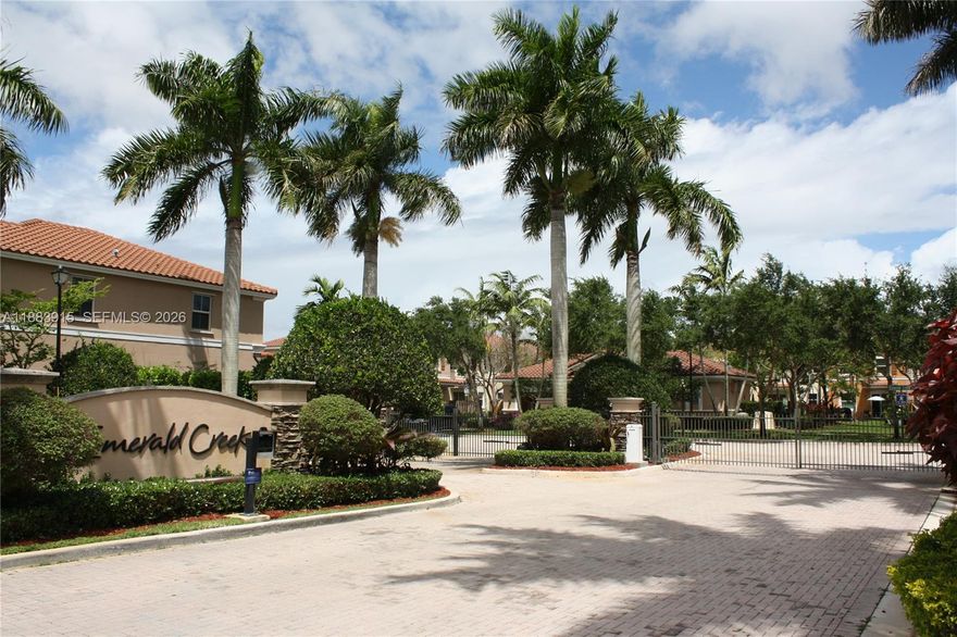 Welcome to your dream home in the gated community of Emerald Creek Townhomes! This exquisite 4-bedroom, 2½-bath residence offers impact windows, a graceful Mediterranean style, and volume ceilings. The updated kitchen features granite counters, stainless steel appliances, and wood cabinetry. New laminate flooring on the stairs and second floor, while the first floor is finished with elegant tile. Spacious bedrooms include walk-in closets and natural light throughout. Additional upgrades include exterior paint and pre-wired for ADT. Enjoy low HOA fees, a community pool, and professionally maintained landscaping. Prime location: walking distance to American Heritage School, close to I-595, I-75, Sawgrass Mills Mall, and top-rated public schools. This move-in-ready gem won’t last!