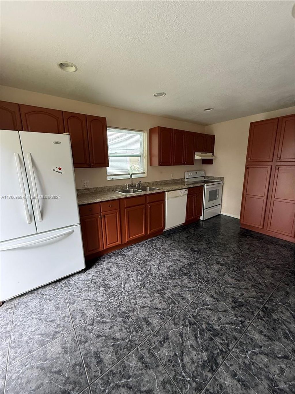 Photo of 836 Bayberry Dr, Lake Park, FL 33403 (MLS # A11706759)