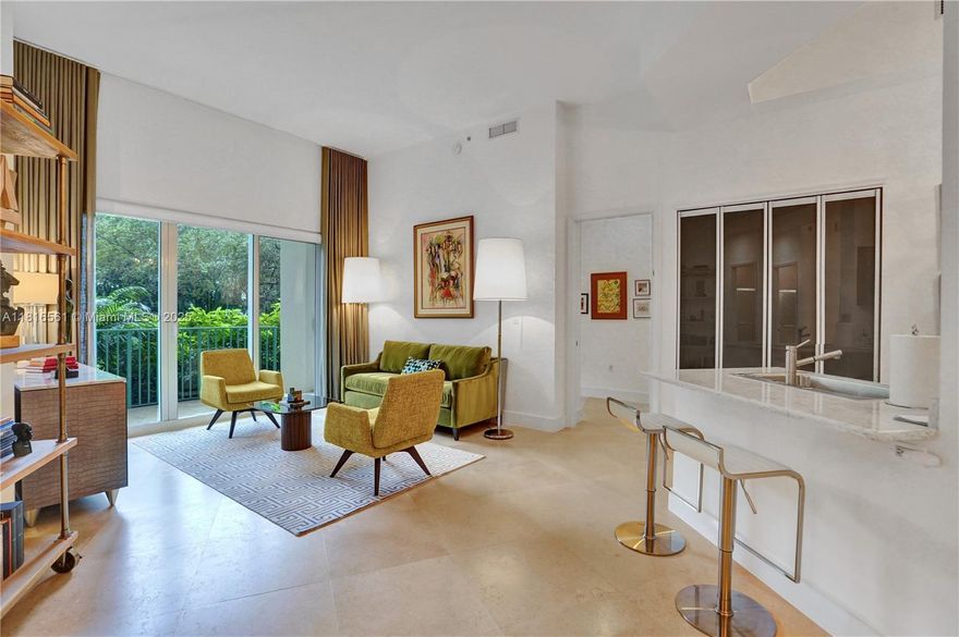 Welcome to Turnberry Village North! This spacious and beautifully maintained 2-bedroom, 2-bath unit offers high ceilings, an open kitchen with granite countertops and stainless steel appliances, and a split floor plan for privacy. Enjoy garden views from your private terrace with direct access to the pool and amenities—feels like a townhouse! Washer/dryer in unit, walk-in closets, and one assigned parking space. Located in the heart of Aventura, steps from the golf course, Aventura Mall, top schools, and houses of worship. Resort-style building with pool, gym, spa, and 24-hour security. Pet-friendly. Perfect as a primary residence or vacation home. 4 EV Chargers. Easy to show!