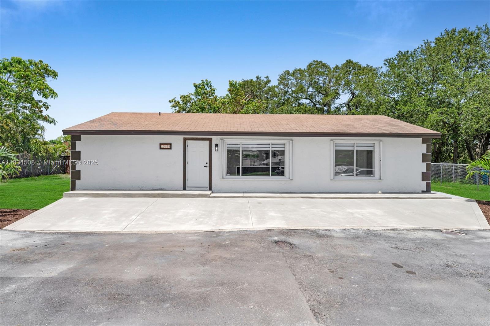 Discover this fully renovated 4-bedroom, 2-bathroom home in Miami Gardens, offering 1,344 square feet of modern living space. Every inch of this residence has been thoughtfully updated with high-end finishes and designer touches, creating a perfect blend of style and functionality. The open-concept layout features a stunning kitchen with brand-new stainless steel appliances, quartz countertops, and soft-close cabinetry. The spacious living area flows seamlessly to the bedrooms, including a primary suite with ample closet space. Both bathrooms have been completely redone with contemporary tile work and premium fixtures. Brand new A/C system to keep you cool every summer! We take section 8.