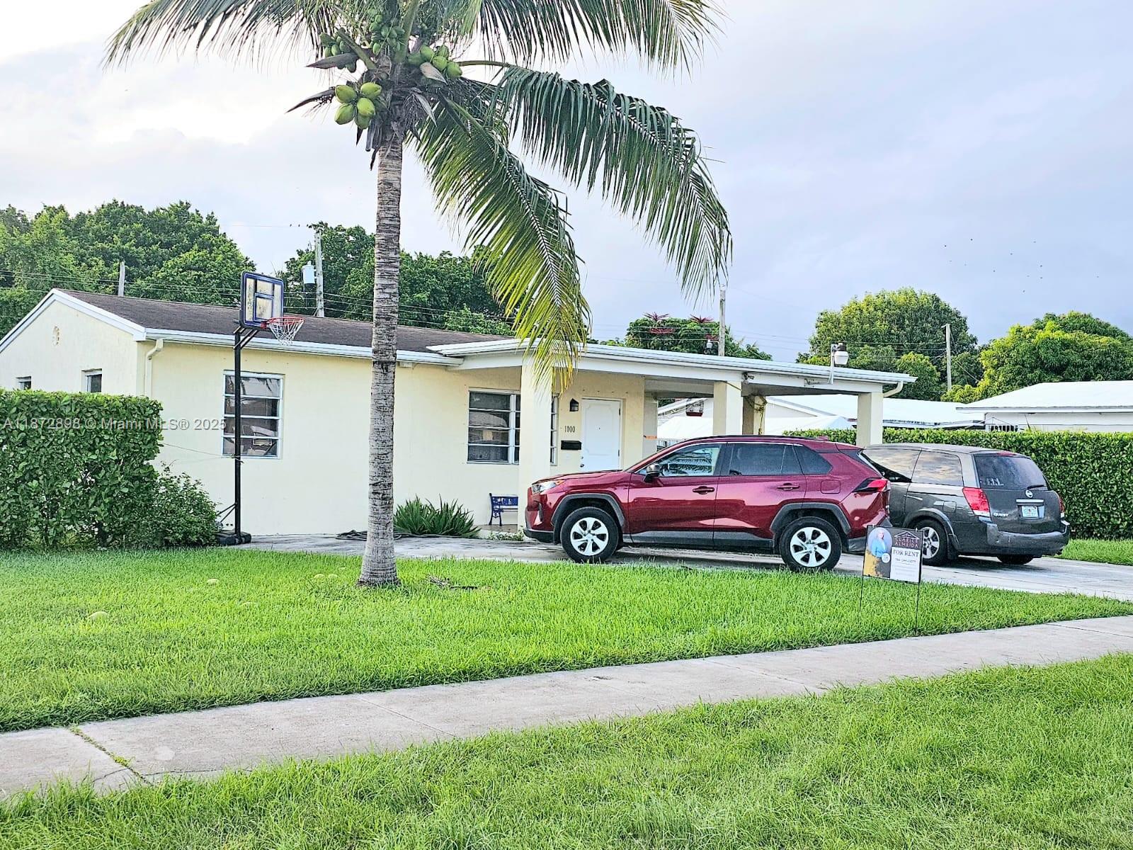 Comfortable 2/1 Single Family Home in the Heart of Homestead. Charming and well-maintained spacious family room. Recently painted inside & out. Brand new A/C, ceiling fan, and blinds. Tile flooring throughout. Dishwasher, washer & dryer included. Carport garage with plenty of additional parking. Fully fenced backyard with security lights (front & back). Yard maintenance is included in the rent. Prime Location: Situated in a quiet neighborhood with convenient access to Krome Ave, the Turnpike, and US-1. Close to Homestead Downtown, Baptist Hospital, Air Force Base, restaurants, supermarkets, schools, shopping centers, theaters, and public transportation. No HOA. Easy to show and rapid approval. Don’t miss out on this move-in-ready home with great natural light and plenty of space!
