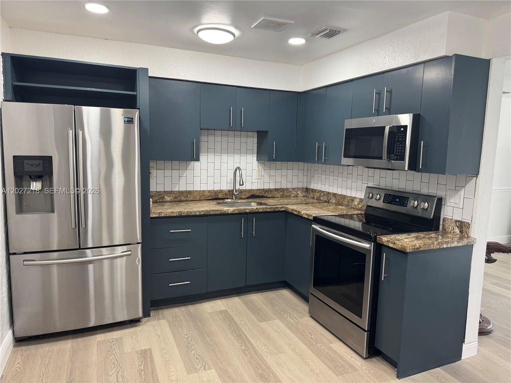 Photo of 1101 NW 55th Ave #A, Lauderhill, FL 33313 (MLS # A12027218)