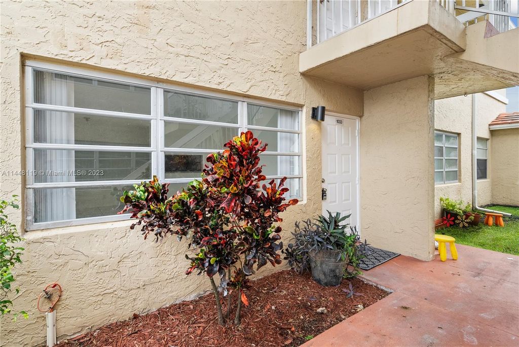 Photo of 1033 Twin Lakes Dr #27-D, Coral Springs, FL 33071 (MLS # A11448119)