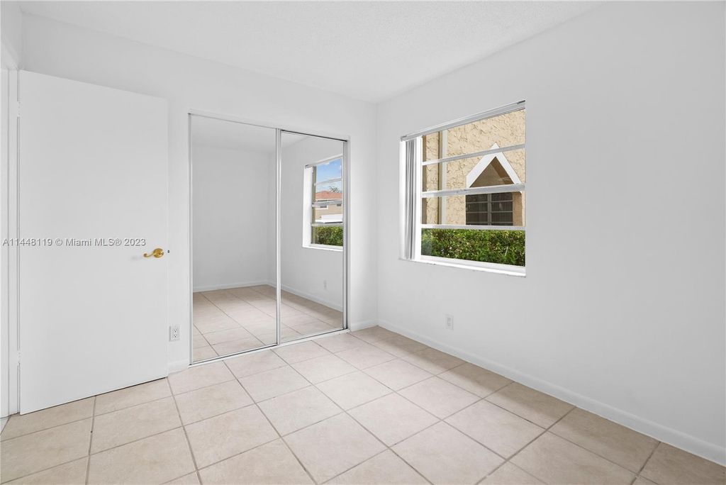 Photo of 1033 Twin Lakes Dr #27-D, Coral Springs, FL 33071 (MLS # A11448119)