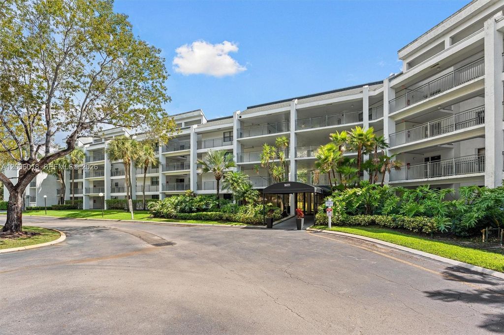 Photo of 16171 Blatt Blvd #401, Weston, FL 33326 (MLS # A12006018)
