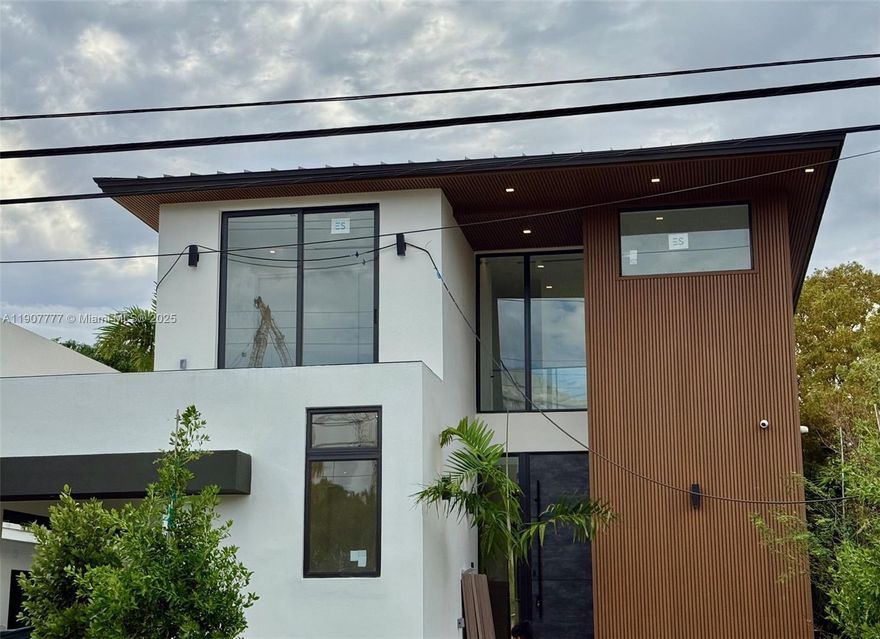 This brand new, exquisite two-story residence is the epitome of modern luxury living. Boasting 6 beds, 5.5 baths, and 4,010 square feet of meticulously designed space, it offers an abundance of room for the entire family. Inside, you'll find soaring high ceilings, beautiful exquisite flooring, a huge master suite with a dream walk-in closet. The gourmet, state-of the-art kitchen is a chef's delight, complete with a generous pantry and laundry room. The outdoor oasis features a refreshing swimming pool & a dedicated barbecue area, perfect for entertaining. Welcome to a rare opportunity in the heart of the highly sought-after Surfside, located just two blocks from the beach. You'll be minutes from the world-renowned _luxury shopping and dining of Bal Harbour Shops and places of worship.