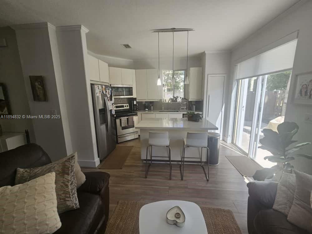 DORAL SOUTHEAST PATIO-HOM - Residential