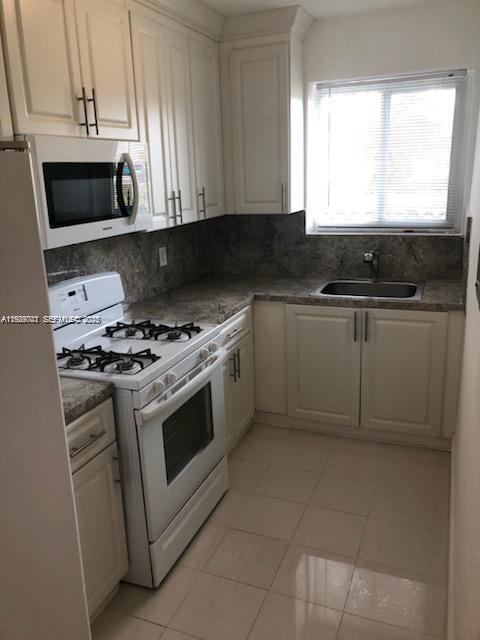 NORMANDY PALMS CONDO - Residential Lease