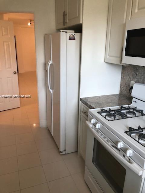 NORMANDY PALMS CONDO - Residential Lease