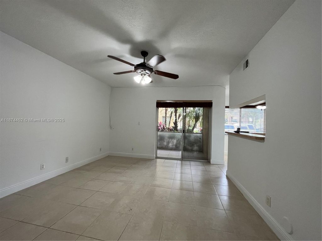 Photo of 5740 Rock Island Rd #273, Tamarac, FL 33319 (MLS # A11874452)