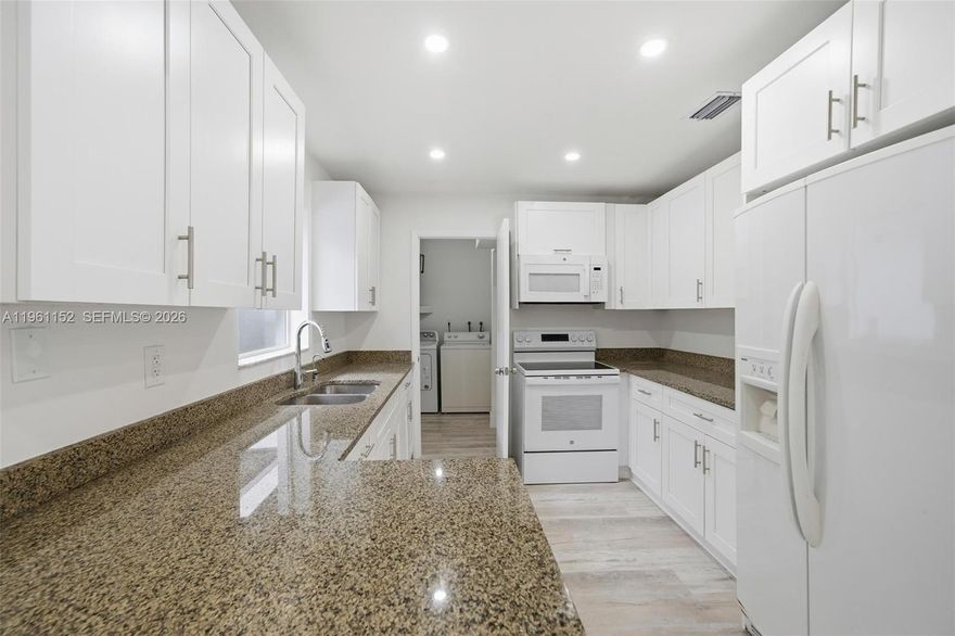 Three bedroom, one & a half bathroom apartment. This unit is located on the first floor boasting over 1,100 square feet of living space. It has its own private entrance, 2 parking spaces, spacious kitchen, ample bedroom and recently updated yard featuring turf for low maintenance.