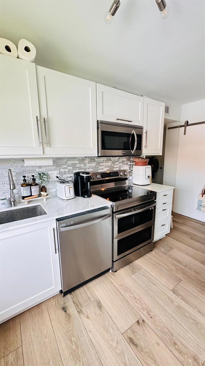 RACQUET CLUB APARTMENTS A - Residential