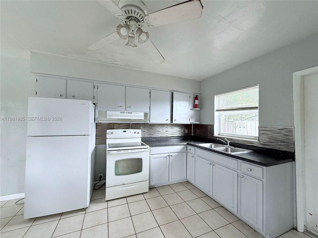 Photo of 815 NW 16th St #815, Fort Lauderdale, FL 33311 (MLS # A11981935)