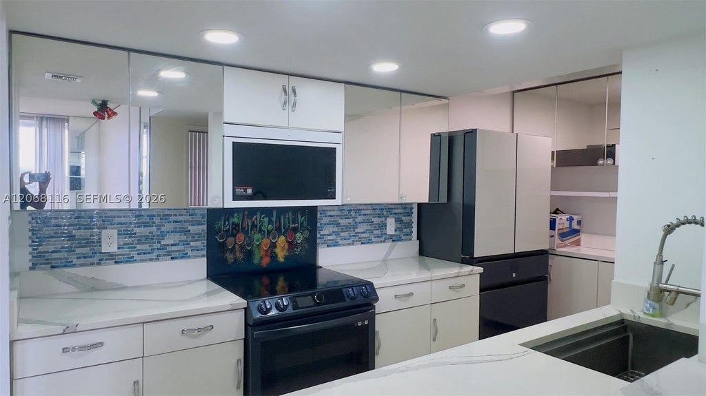 Photo of 777 S Federal Hwy #RPPH1, Pompano Beach, FL 33062 (MLS # A12068116)