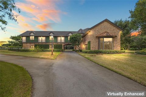 Photo of 8700 Surrey Ln, Boca Raton, FL 33496 (MLS # A11797160)