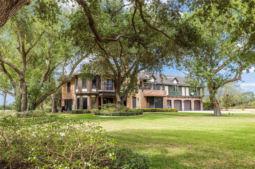 Photo of 8700 Surrey Ln, Boca Raton, FL 33496 (MLS # A11797160)