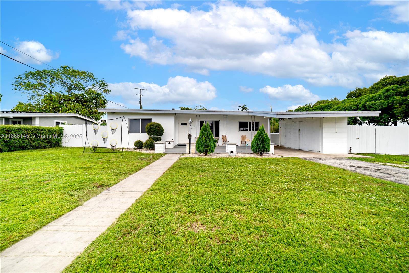 Remarkable 3-bedroom, 2-bathroom corner home situated on a spacious corner lot, offering around 1,549 sq. ft. of living space. Ideal for entertaining, the inviting Florida Room overlooks one of the community's largest lots at 8,791 sq. ft. This residence features an open floor plan, elegant terrazzo and tile flooring, and a beautiful kitchen. With a new roof installed in 2022, impact windows, and no HOA fees, this exceptional property in high-demand Miami Gardens is a rare opportunity you won’t want to miss!