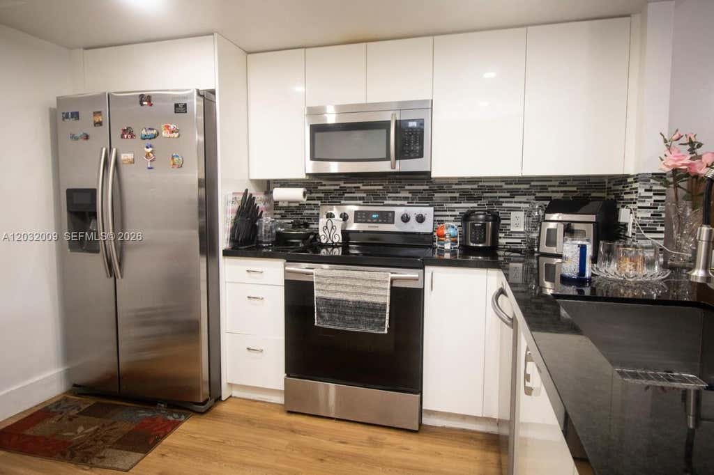Photo of 7200 NW 1st St #103, Plantation, FL 33317 (MLS # A12032009)