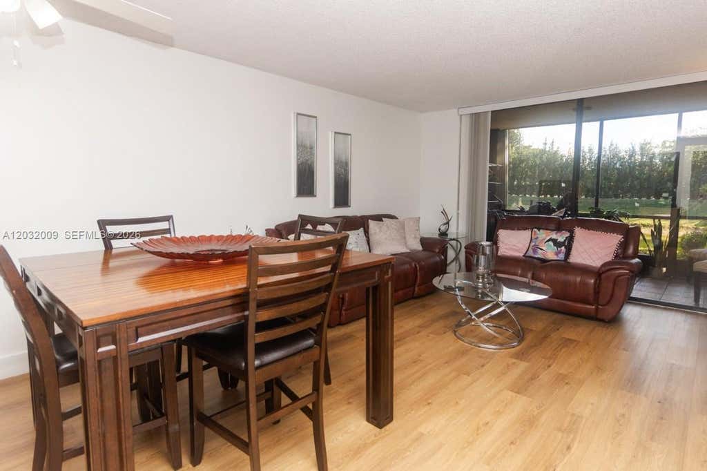 Photo of 7200 NW 1st St #103, Plantation, FL 33317 (MLS # A12032009)