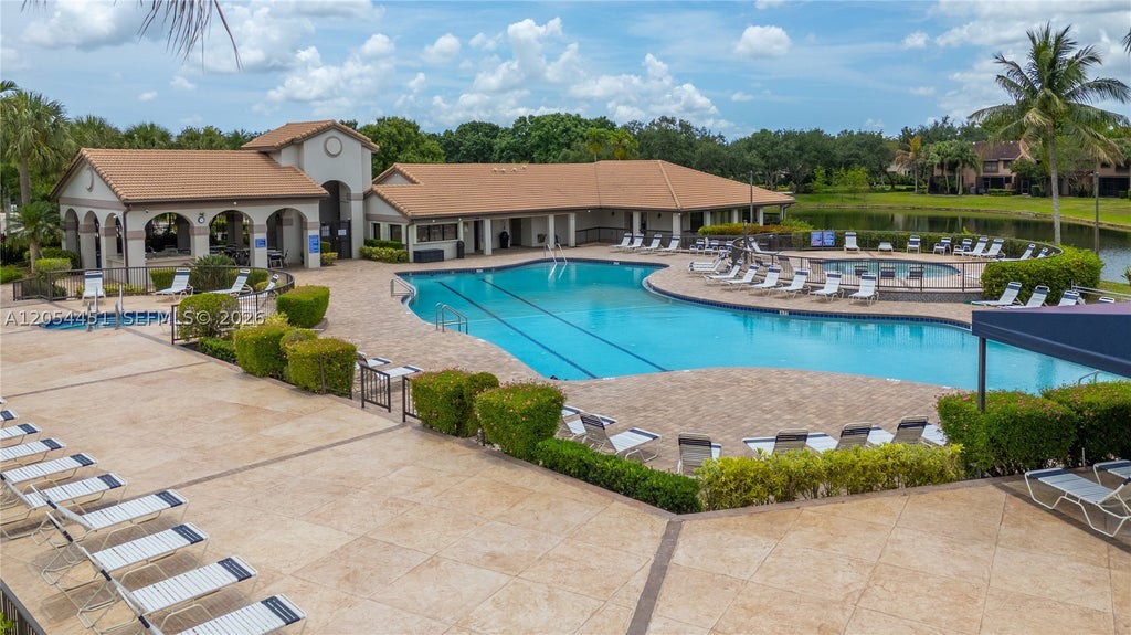 Photo of 10690 NW 14th St #128, Plantation, FL 33322 (MLS # A12054451)