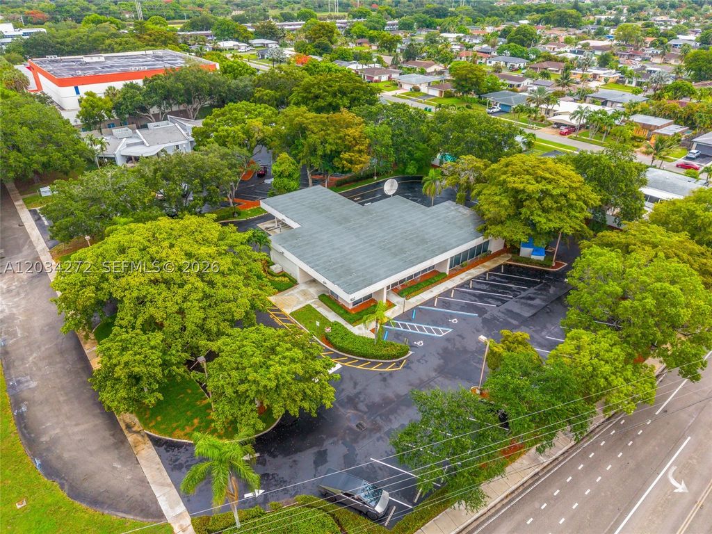 Photo of 8200 N University Dr, Tamarac, FL 33321 (MLS # A12034272)