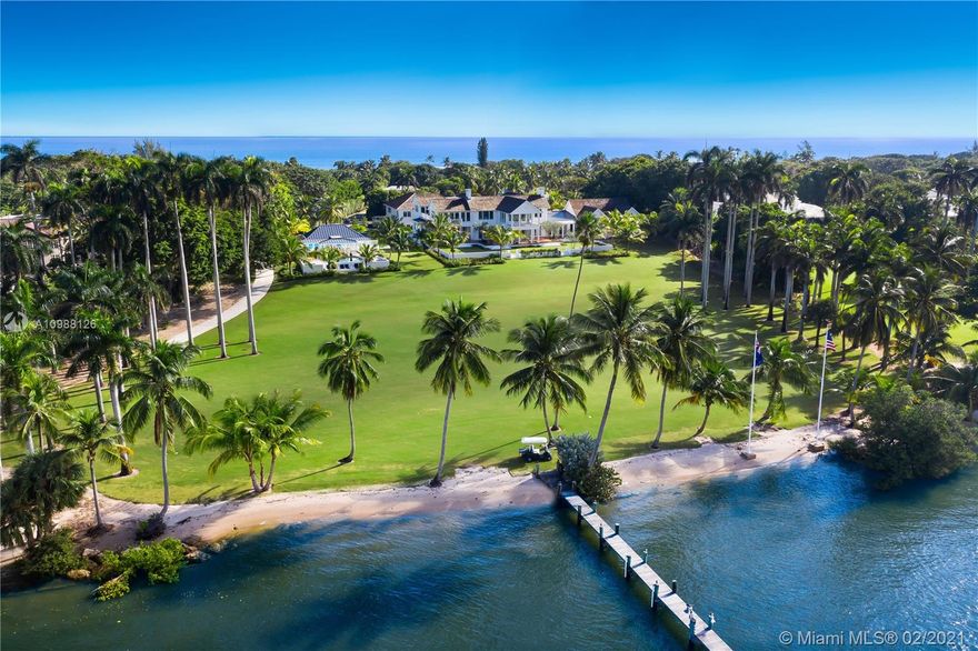 Welcome to “Tranquility”. One of the original ocean-to-Intracoastal estates on Jupiter Island, the stunning full compound of buildings, situated on a sprawling 8.31-acre lot, was built for a barefoot elegance lifestyle. It boasts 31,820 total SF of living space, including the Main House, Coach House, Pool House, Tennis House, Boat House, Carriage House, Beach House & 5,000 SF basement. With 10BR,12+6BA,172’ of oceanfront, & 370’ of WF on the Intracoastal Waterway, the estate sports a modern tropical/yacht-inspired feel with dockage for a 150’ yacht. Remote & set back, the estate is a true escape, offering the utmost in privacy, and one-of-a-kind amenities including a US open sized tennis court, fitness center, movie theater, elevator, 2 main pools, spa, wine cellar, bar & gourmet kitchen.