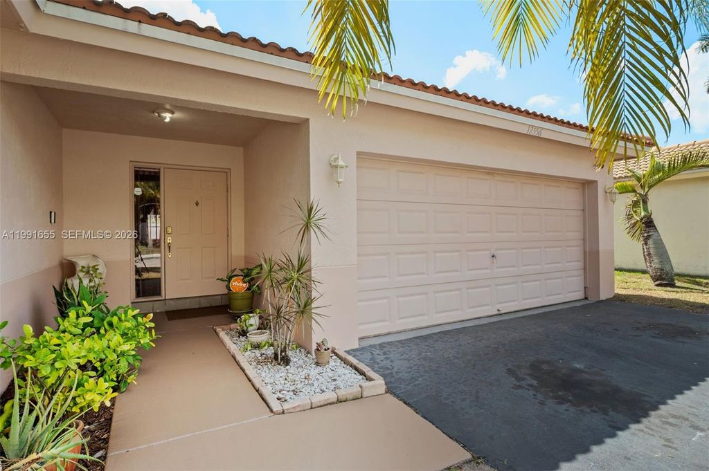 Photo of 12556 NW 10th Pl, Sunrise, FL 33323 (MLS # A11991655)