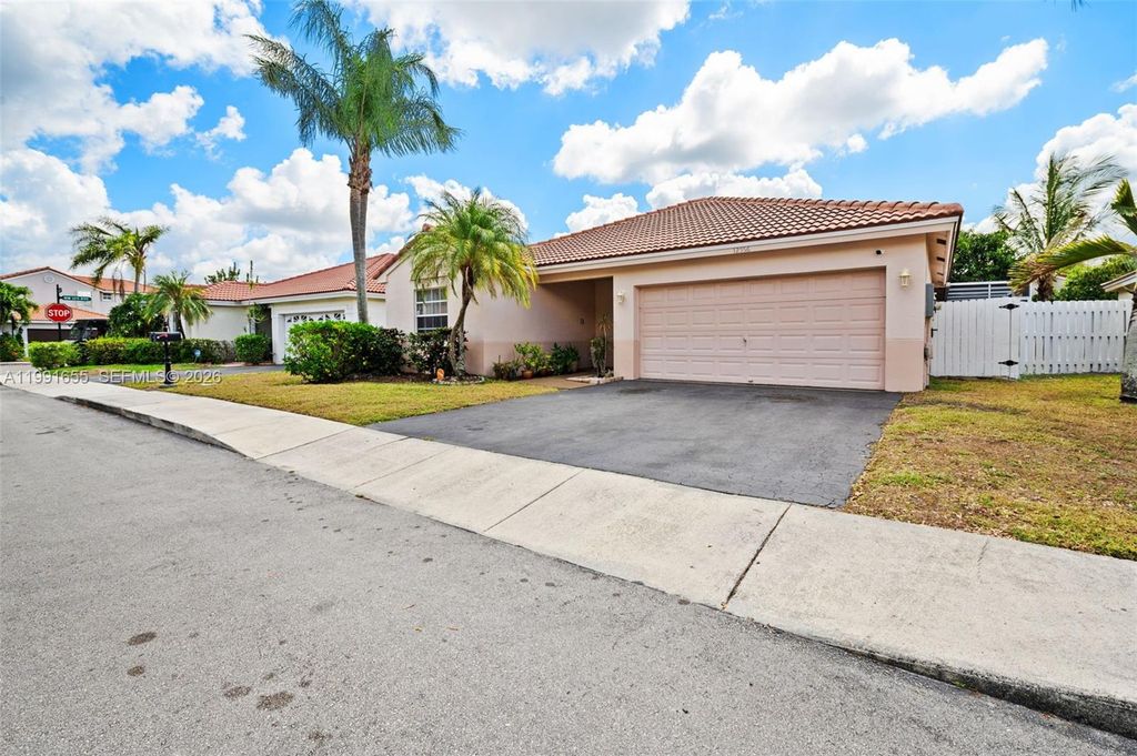 Photo of 12556 NW 10th Pl, Sunrise, FL 33323 (MLS # A11991655)