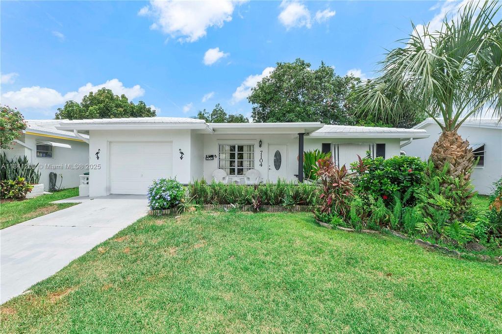 Photo of 7104 NW 71st Ave, Tamarac, FL 33321 (MLS # A11841200)