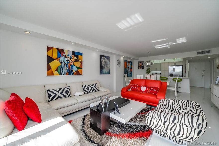 New New New! 100% renovated, contemporary dream! White+Bright+Eye Popping. Sold Furnished. Located in one of the best residential areas in Aventura. On Williams Island, the apartment has amazing water views. 1b 2ba unit w/ access to huge balcony from bedroom & living area. No expense was spared. Enter this wide open condo w/ state of the art white new open kitchen, all new baths-Nothing original remains. Some of the finest finishes: white porcelain floors, new doors, custom closets, stunning leather sofa, bar stools, white contemporary bedroom set. Just move in with your toothbrush. A rare gem! assigned parking space near door. Building has tennis & basketball courts, 2 pools, huge deck, fitness center, mini golf, bbq area, beautiful backyard, 24h security (gate) concierge, Zumba classes.