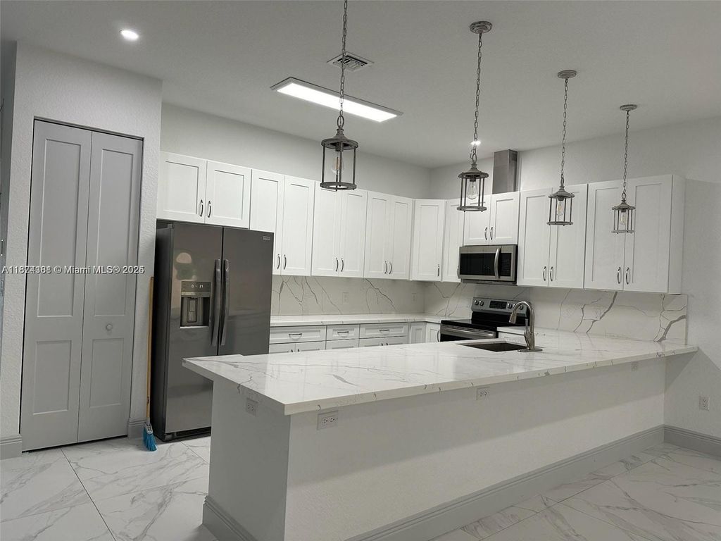 Photo of Dania Beach, FL 33004 (MLS # A11874181)