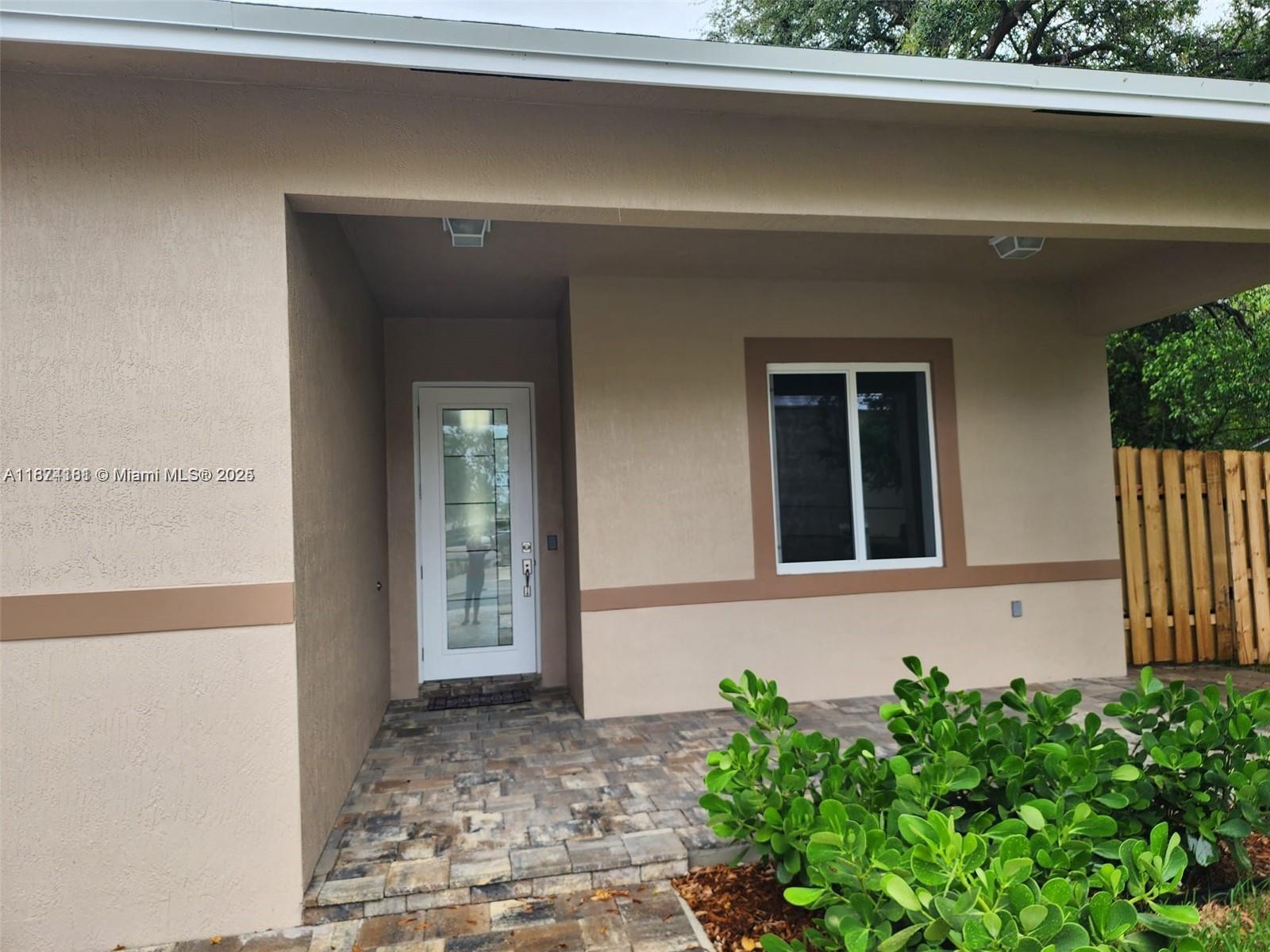 This newly built home features a modern design and quality finishes. It has high ceilings and impact-resistant windows, and premium appliances are included. The attached garage has a private, fenced yard. The home is in a Prime location near major roads, schools, the airport, and the beach. Schedule your showing today—this property won’t last!