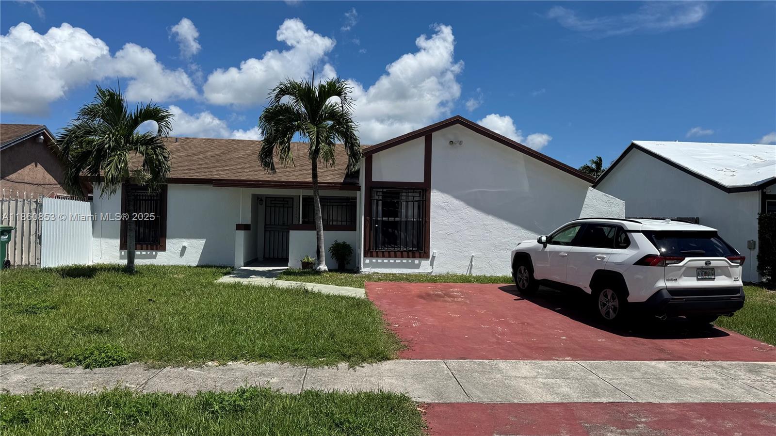 This 3-bedroom, 2-bathroom residence is ideally located near to the busway and US-1, offering convenience and accessibility. It has been freshly painted Large backyard fence