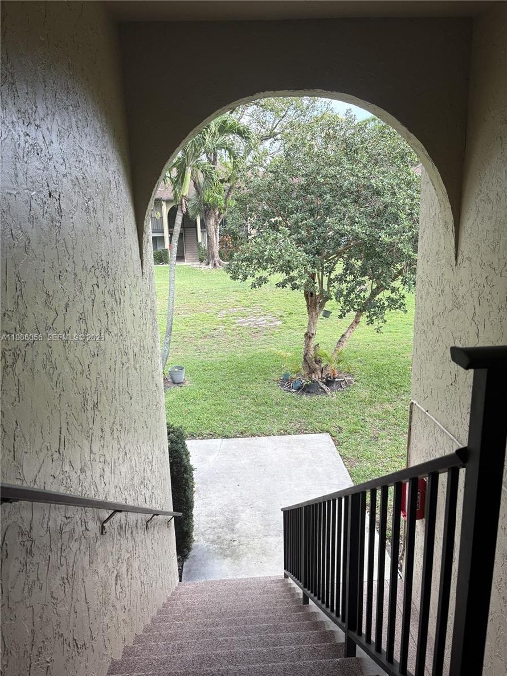 Photo of 721 Sunny Pine Way #C2, Green Acres, FL 33415 (MLS # A11988056)