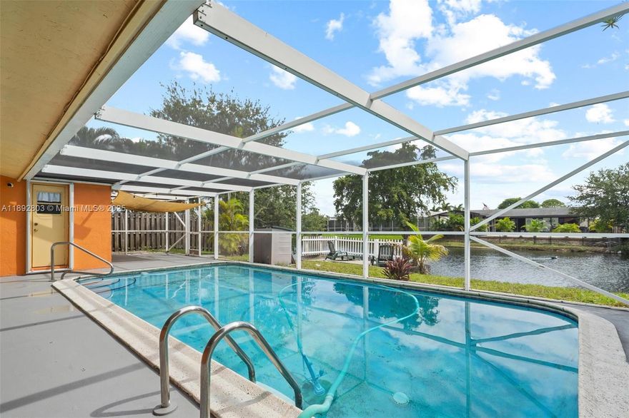 Welcome to your waterfront oasis in Sunrise Golf Village! This beautifully maintained 3-bedroom, 2-bath single-family home offers nearly 2,000 sq ft of living space and sits on a 6,900 sq ft canal-front lot with no HOA. Enjoy Florida living with a private pool, spacious deck & patio ...perfect for entertaining or relaxing by the water. Interior features include a bright, open layout with ceramic tile flooring throughout, updated kitchen appliances, and a converted garage for extra living space or storage. Located in a quiet neighborhood with a circular driveway, this home is just minutes from schools, parks, shopping, and dining. Newer roof, A/C, and water heater offer peace of mind. OK to lease – great for investors or end users!