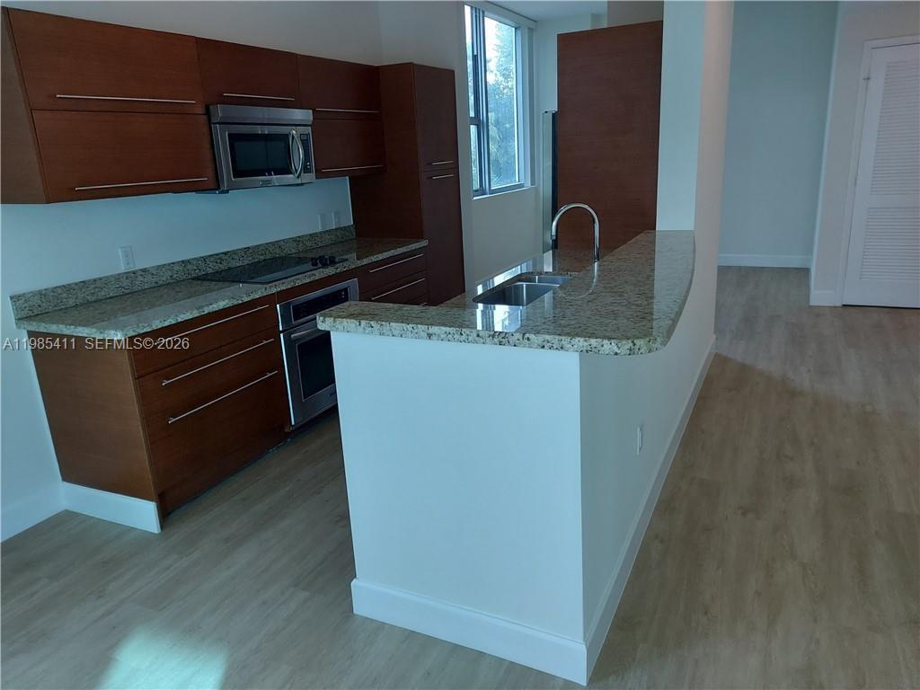 TAO SAWGRASS CONDOMINIUM - Residential