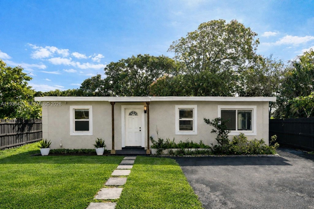 Photo of 1032 NW 11th Pl, Fort Lauderdale, FL 33311 (MLS # A11936475)
