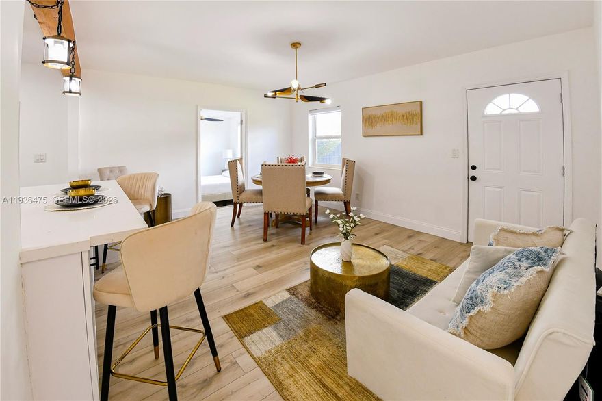 Modern and fully renovated 3BR/2BA home with an open-concept layout—living area seamlessly integrated with the kitchen. Bright interior, updated finishes, laminate flooring throughout, and new appliances. Enjoy a large, lush backyard with plenty of space to relax and entertain. Convenient Fort Lauderdale location close to major roads, shopping, and dining.