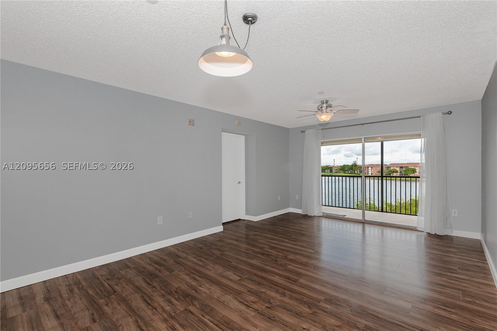 Photo of 550 SW 138th Ave #404K, Pembroke Pines, FL 33027 (MLS # A12095656)
