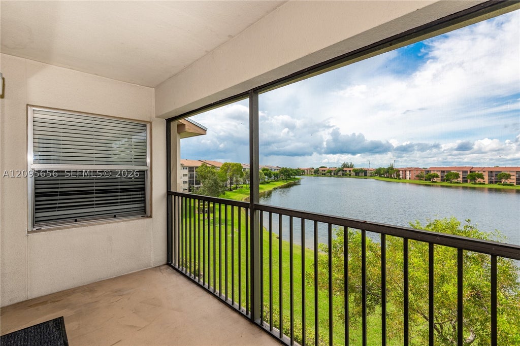 Photo of 550 SW 138th Ave #404K, Pembroke Pines, FL 33027 (MLS # A12095656)