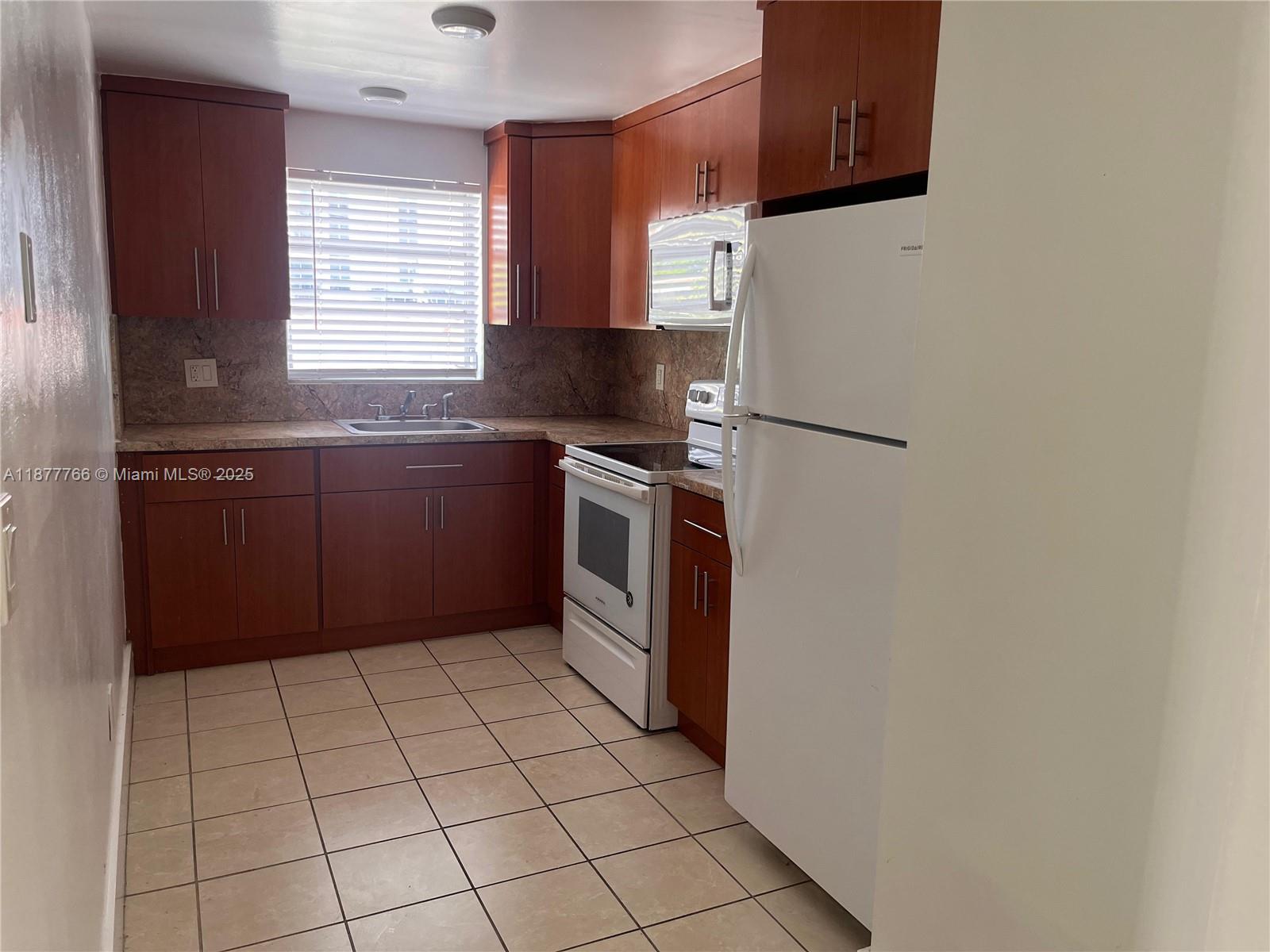 Location, Location!!!! Great condo located in Biscayne, Mexican tile throughout, fresh paint, and a layout designed for comfortable living. Close to downtown Miami and the design district. Miami and the design district. Only 5 minutes from South Beach, 15 minutes from Miami International Airport and close to entertainment district, restaurants and major highways. Laundry room, 1 private parking space, water is included in rent, electricity and internet must be paid by tenant. While the elevator is currently under repair, it will be fixed soon. Easy to show and easy approval Must see!!