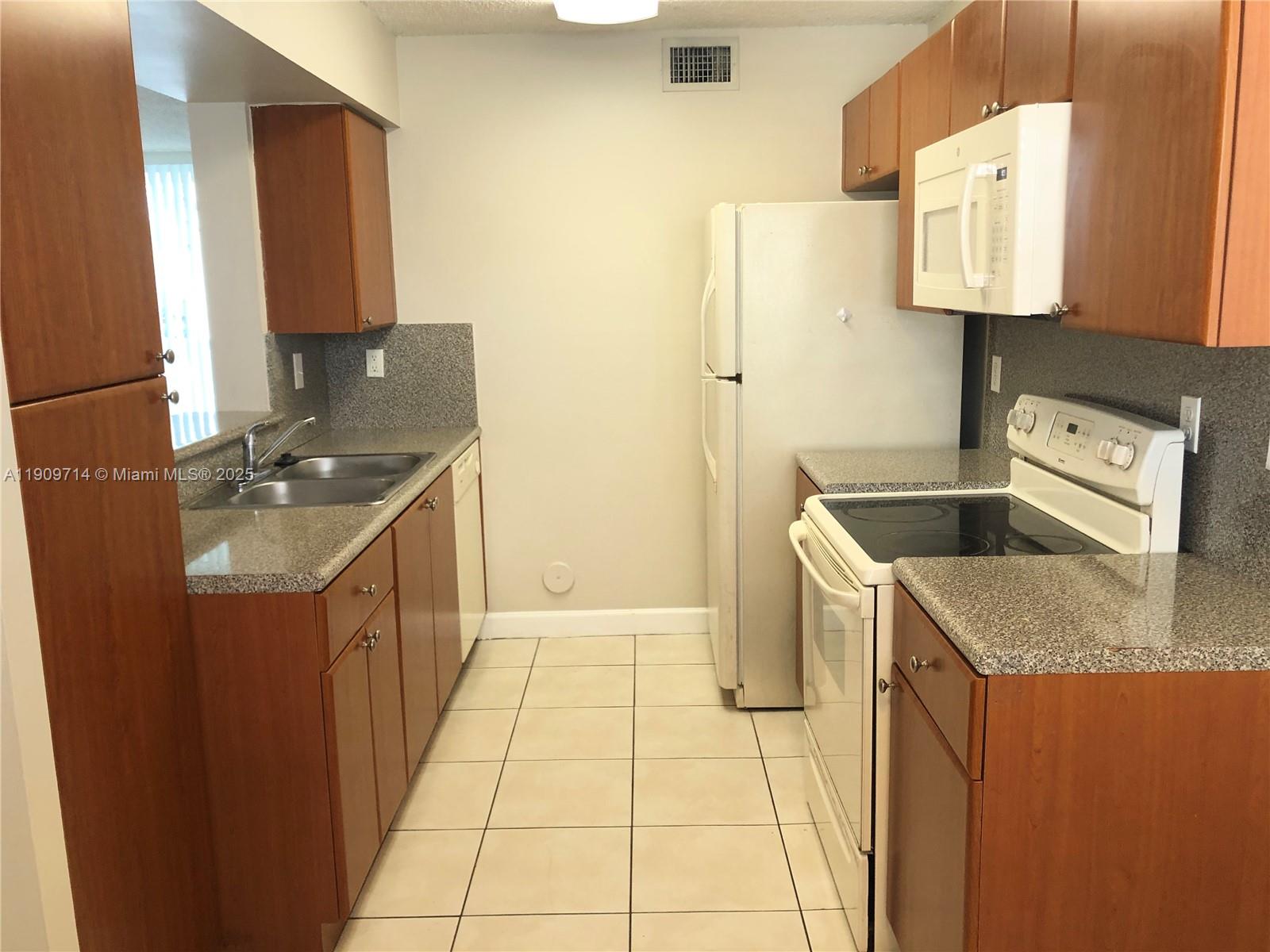 THE GREENS AT DORAL CONDO - Residential Lease