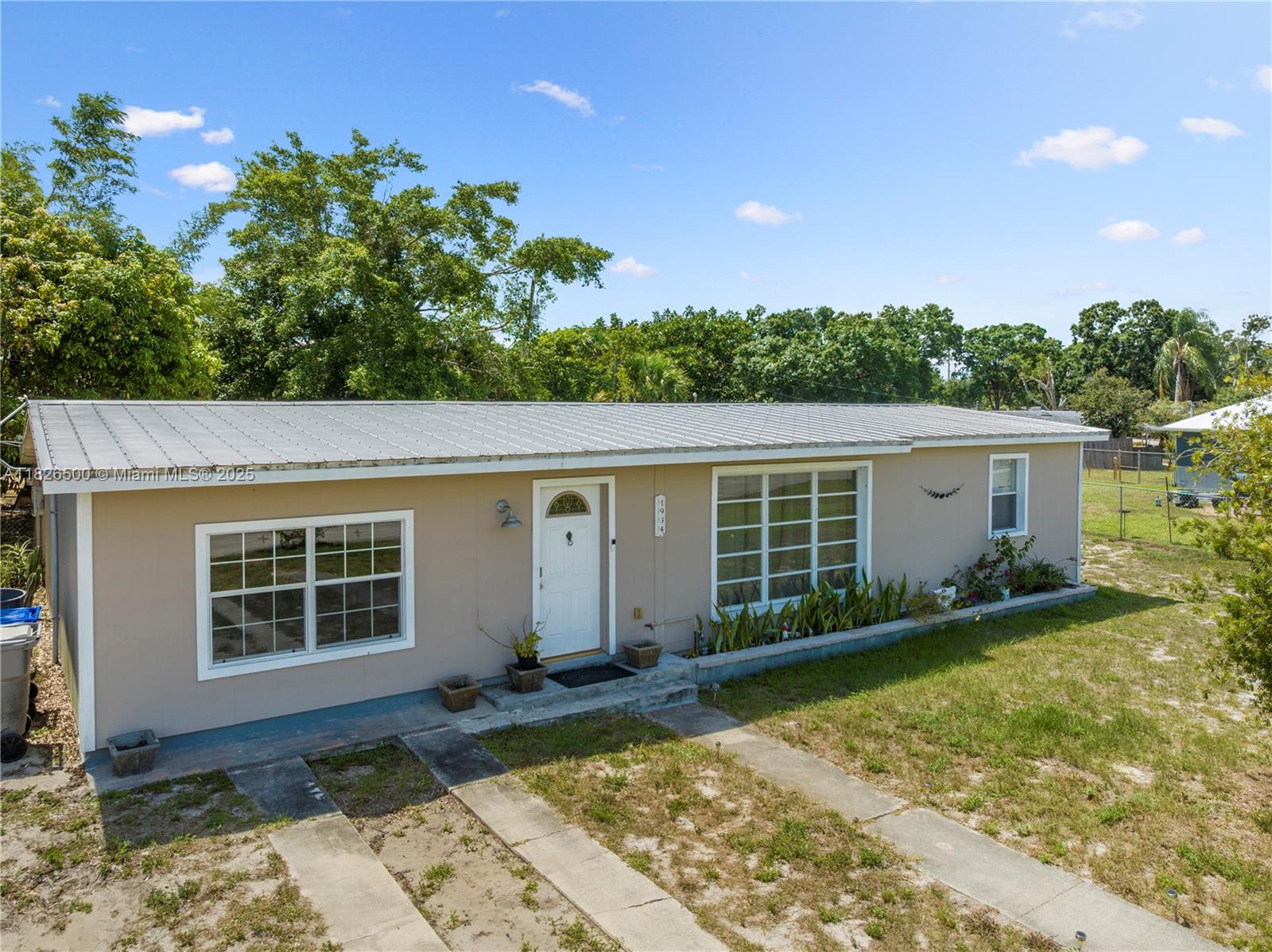 Nestled in the desirable Vero Highlands community, this 3-bedroom, 1.5-bath home sits on an expansive lot filled with mature fruit trees—perfect for outdoor enthusiasts or gardeners. The spacious driveway offers ample parking, and an above-ground pool adds a fun spot to cool off on hot Florida days. With a flexible layout, this property offers excellent potential for investors—it can easily be converted into a duplex to maximize rental income. There’s currently no central AC, but motivated sellers are willing to contribute toward the installation of a new system. Whether you're looking for your first home or a smart investment, this property offers space, versatility, and plenty of potential. Schedule your showing today—this one won’t last long!